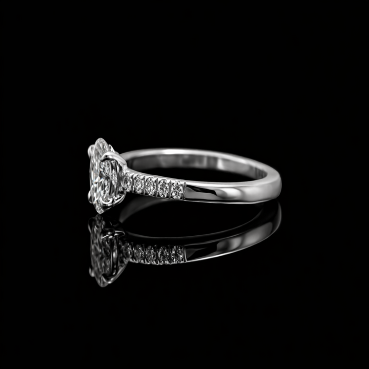 The Elara Oval: Stunning Oval-Cut Solitaire in Polished Silver – Minimalist Engagement Ring with Sparkling Accent Band