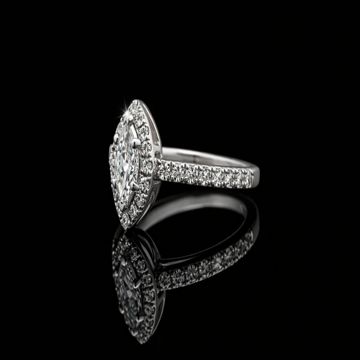 The Marquise Majesty: Shimmering Halo Statement Ring in Polished Silver – Elegant Navette-Cut Solitaire with Accents