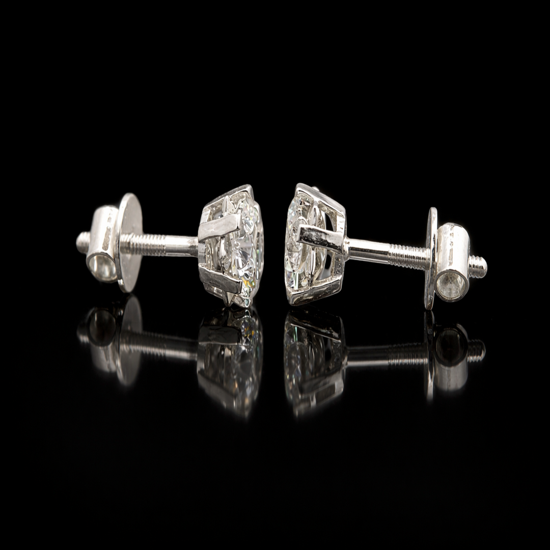 Sparkling Snowflake Silver Stud Earrings – Brilliant Round Solitaire with Decorative Star Setting
