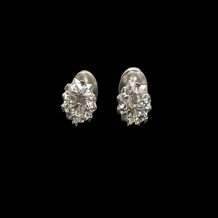 Sparkling Snowflake Silver Stud Earrings – Brilliant Round Solitaire with Decorative Star Setting